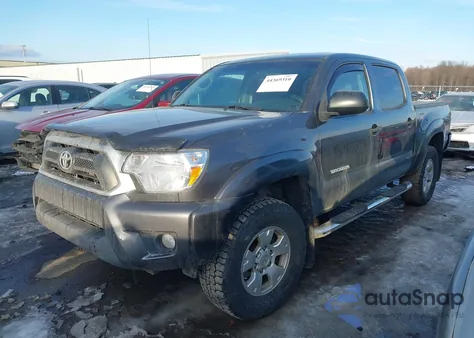 2014 Toyota Tacoma Base V6 z USA, uszkodzony, nr VIN 3TMLU4EN6EM139213